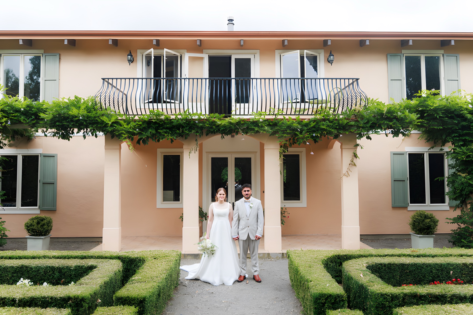 A wedding couple at Villa Candotti, a garden wedding venue near Palmerston North, New Zealand
